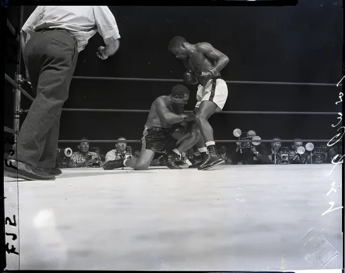 Framed Print : Archie Moore Falls Under Floyd Patterson Framed Print : Archie Moore Falls Under Floyd Patterson