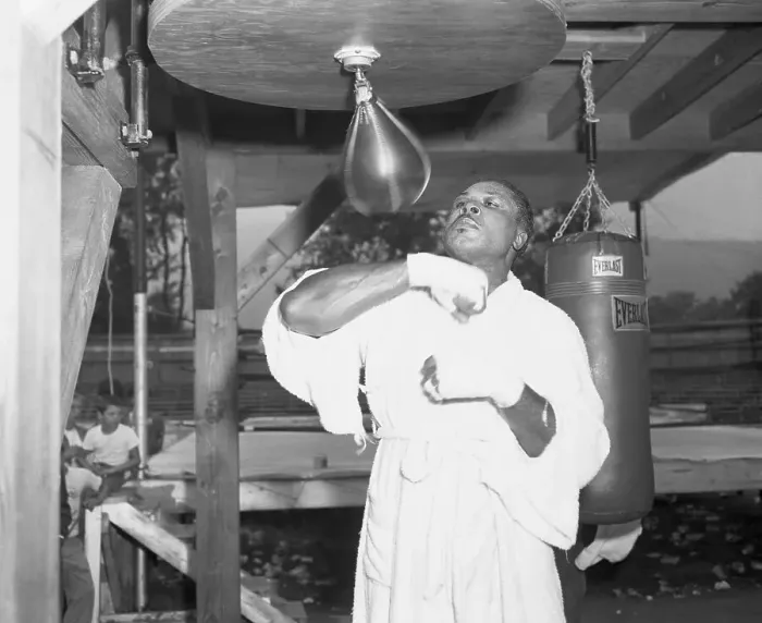 Framed Print : Archie Moore Hitting Punching Bag Framed Print : Archie Moore Hitting Punching Bag