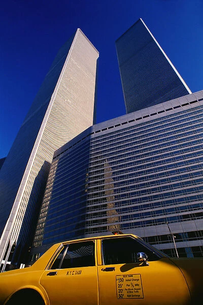 architecture, buildings, cab, car, center, city, day, foreground, low angle view