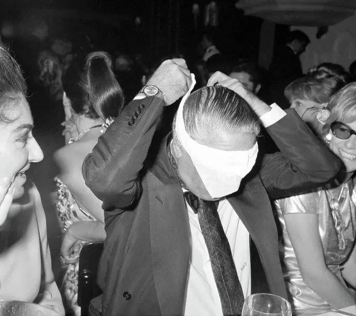 Framed Print : Aristotle Onassis Putting on Blindfold Framed Print : Aristotle Onassis Putting on Blindfold