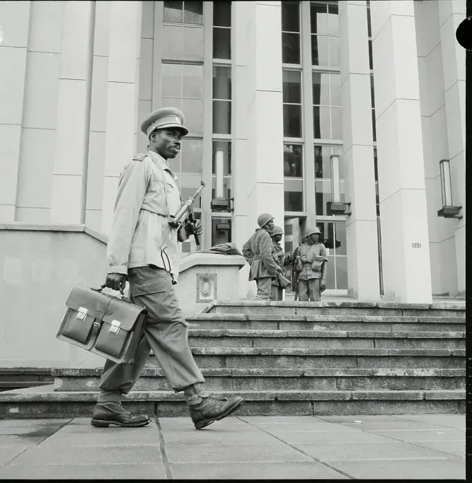 Framed Print : Armed Congolese Civil Servant Strolling to His Job Framed Print : Armed Congolese Civil Servant Strolling to His Job