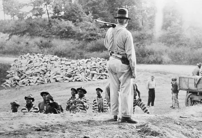 Framed Print : Armed Guard Watching Chain Gang Framed Print : Armed Guard Watching Chain Gang