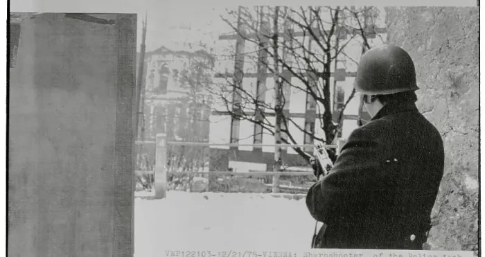 Framed Print : Armed Policeman Gazing at Building Where Hostages are Held Framed Print : Armed Policeman Gazing at Building Where Hostages are Held