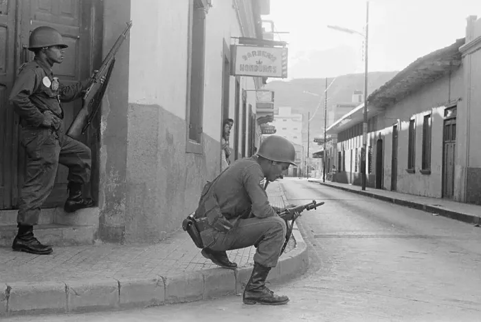 Framed Print : Armed Soldiers Stand Guard on Street Framed Print : Armed Soldiers Stand Guard on Street