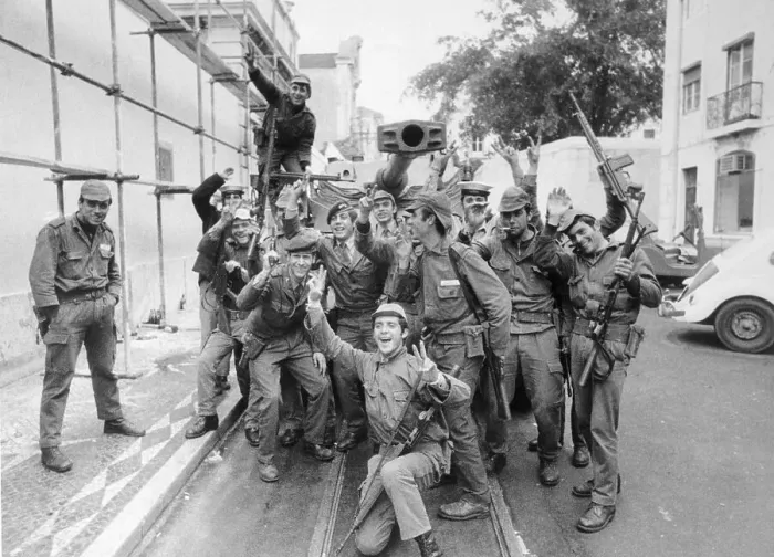 Framed Print : Armed Troops Waving in Street