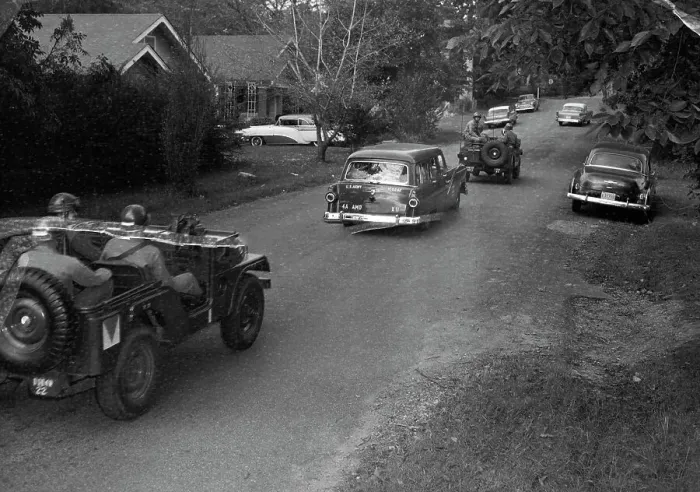Framed Print : Army Jeeps Escort Station Wagon with African American Students Framed Print : Army Jeeps Escort Station Wagon with African American Students