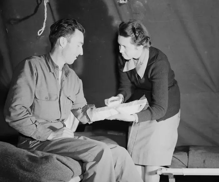 Framed Print : Army Nurse Applying Splint On Soldier Framed Print : Army Nurse Applying Splint On Soldier
