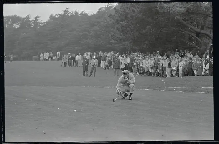 Framed Print : Arnold Palmer Bending Down on Golf Course Framed Print : Arnold Palmer Bending Down on Golf Course