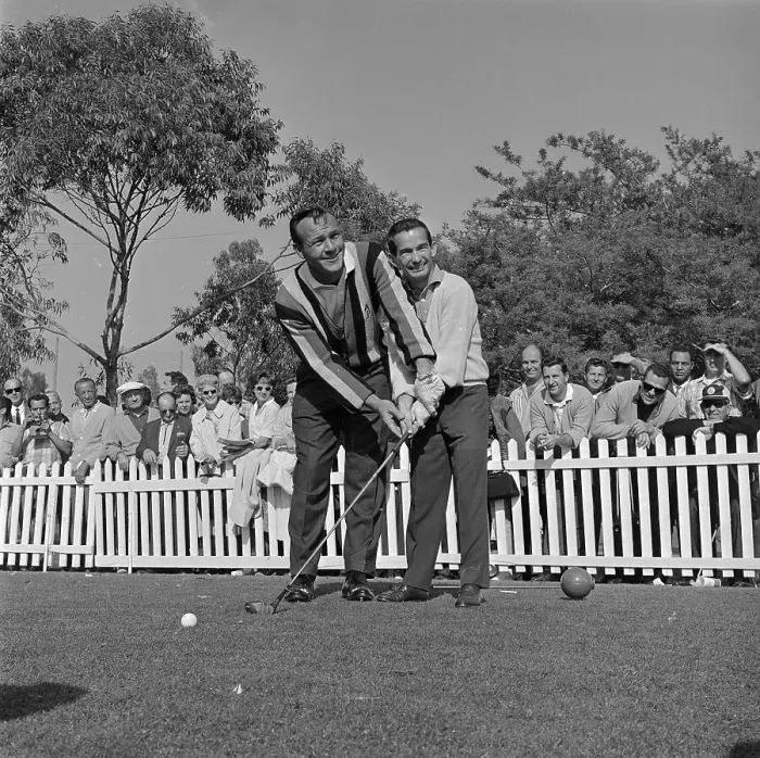 Framed Print : Arnold Palmer Helping Willie Shoemaker with Golf Club Framed Print : Arnold Palmer Helping Willie Shoemaker with Golf Club