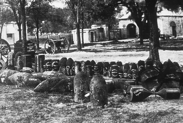 Arsenal. Confederate torpedoes, shot and shells in front of the arsenal in Charleston