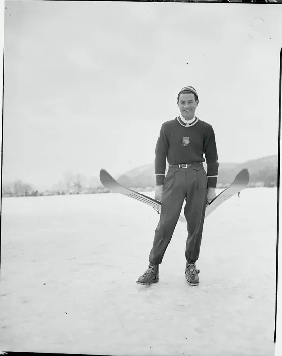 Framed Print : Art Devlin Holding a Pair of Skis Framed Print : Art Devlin Holding a Pair of Skis