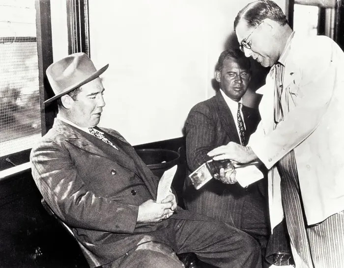 Framed Print : Art Rooney and Swifty Morgan Exchanging Racing Information Framed Print : Art Rooney and Swifty Morgan Exchanging Racing Information