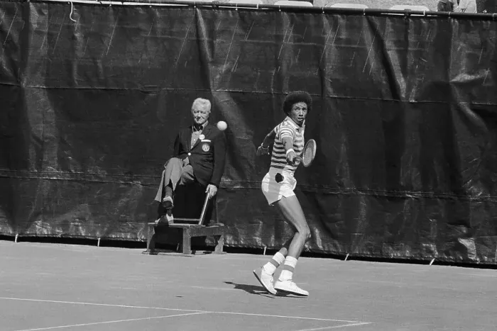 Framed Print : Arthur Ashe Back handing a Return Framed Print : Arthur Ashe Back handing a Return