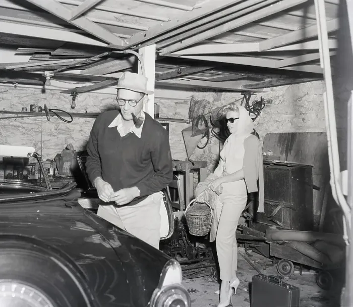 Framed Print : Arthur Miller And Marilyn Monroe in Garage
