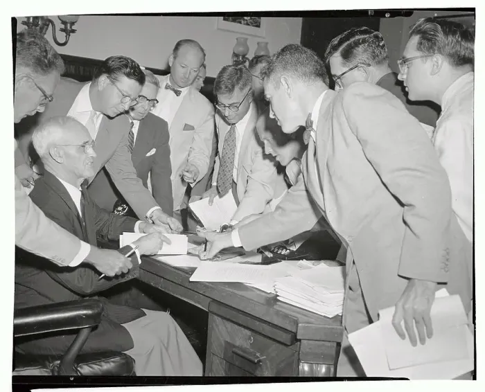 Framed Print : Arthur Watkins Handing out Bill of Particulars Framed Print : Arthur Watkins Handing out Bill of Particulars
