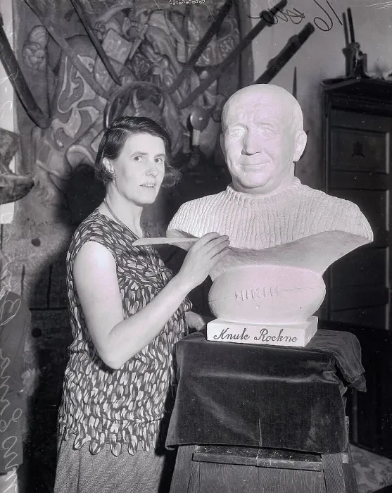 Framed Print : Artist Erna Borresen Standing by Bust of Knute Rockne Framed Print : Artist Erna Borresen Standing by Bust of Knute Rockne