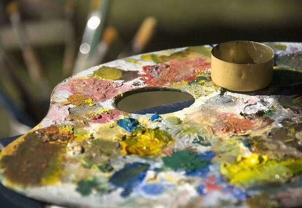 An Artists Palette Filled With Paint