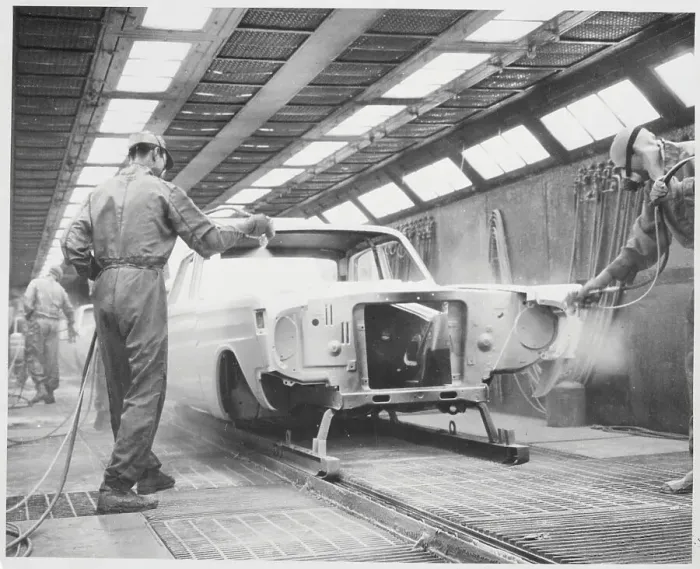 Framed Print : Assembly Line Men Spraying Off Car Framed Print : Assembly Line Men Spraying Off Car