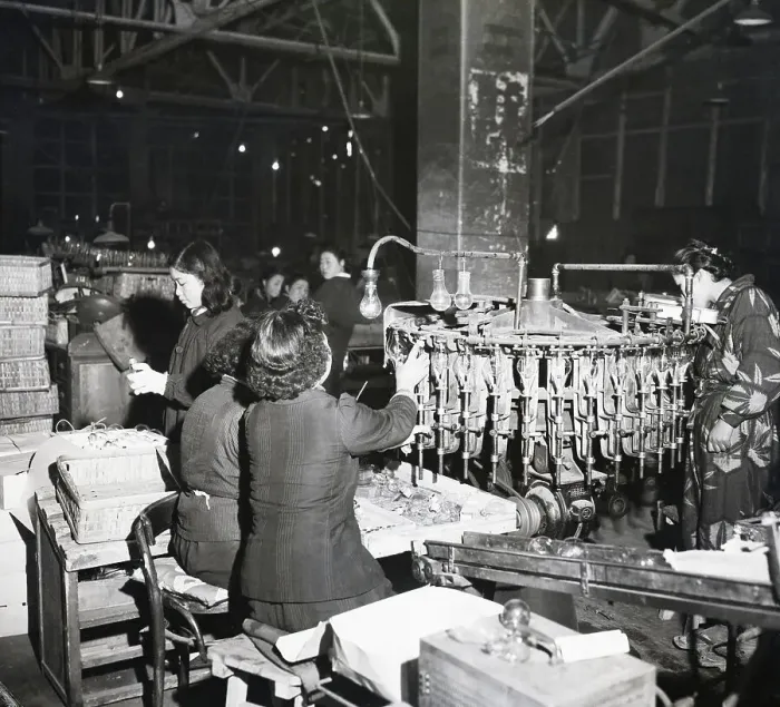 Framed Print : Assembly Line Workers Manufacturing Light Bulbs Framed Print : Assembly Line Workers Manufacturing Light Bulbs