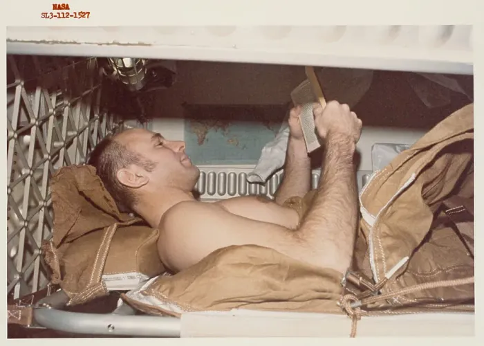 Framed Print : Astronaut Alan Bean relaxing in his sleep restraint Framed Print : Astronaut Alan Bean relaxing in his sleep restraint