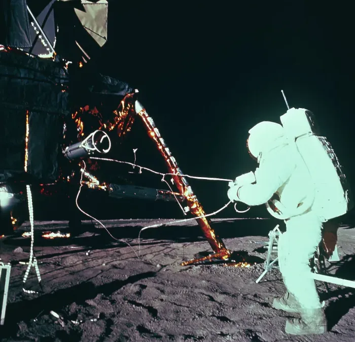 Framed Print : Astronaut Working with Equipment on Moon Surface Framed Print : Astronaut Working with Equipment on Moon Surface