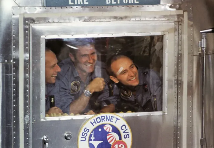 Framed Print : Astronauts Peering from Window