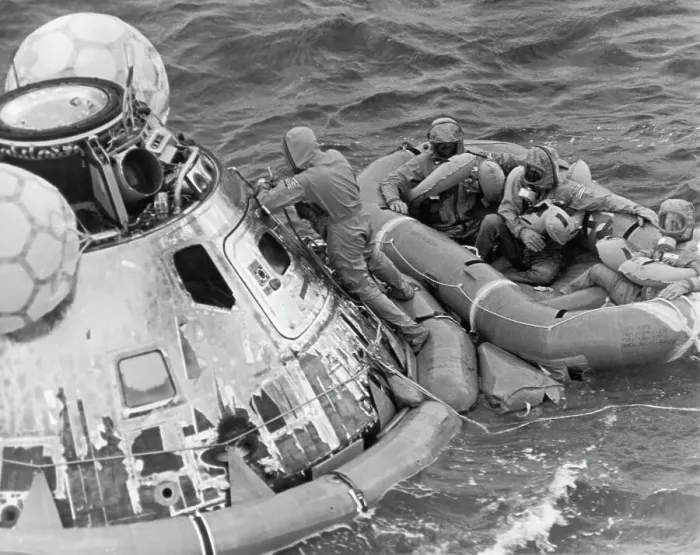 Framed Print : Astronauts in Quarantine Suits on Raft
