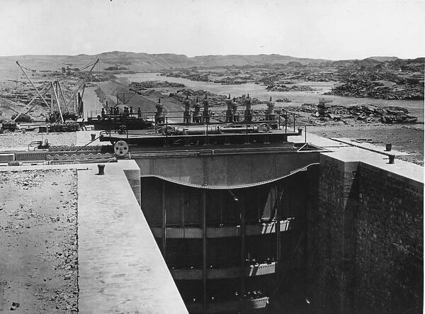 Aswan Dam. circa 1900: Lock gates at Aswan Dam across the Nile River near