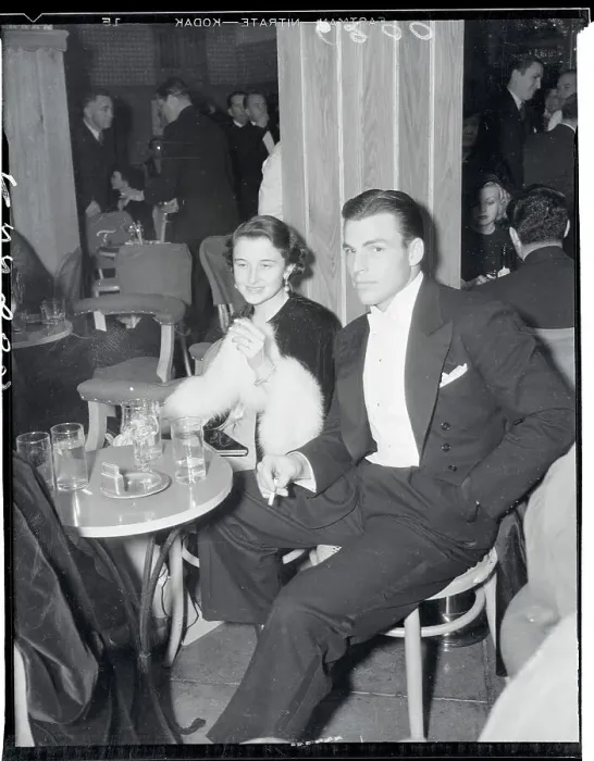Framed Print : Athlete and Actor Buster Crabbe Sitting With His Wife in Club Framed Print : Athlete and Actor Buster Crabbe Sitting With His Wife in Club