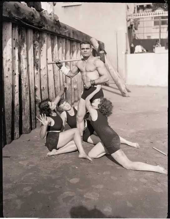 Framed Print : Athlete Admired By Beach Beauties