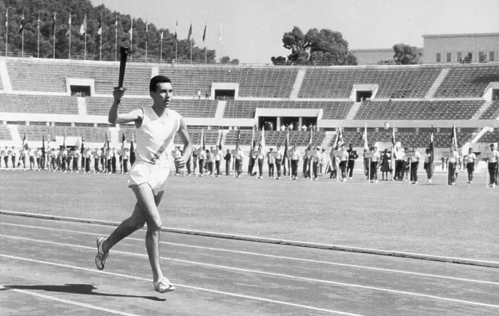 Framed Print : Athlete Jogs & Carries Olympic Torch Framed Print : Athlete Jogs & Carries Olympic Torch