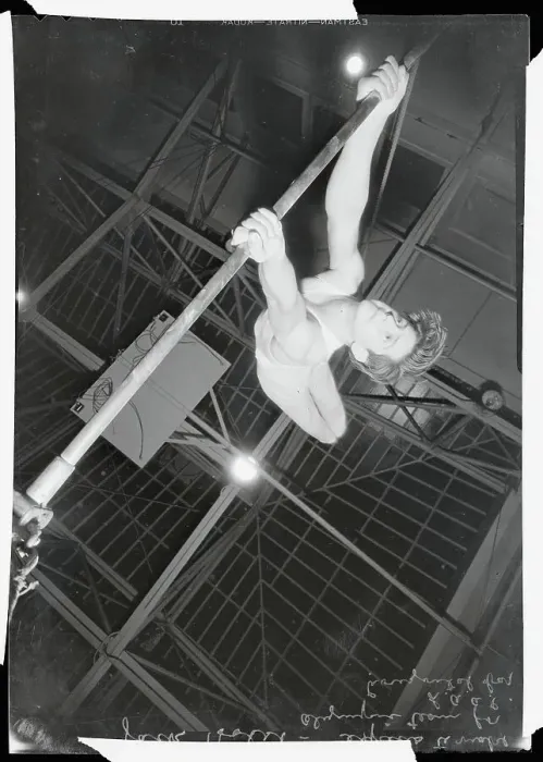 Framed Print : Athlete Practicing Routine on Horizontal Bar Framed Print : Athlete Practicing Routine on Horizontal Bar