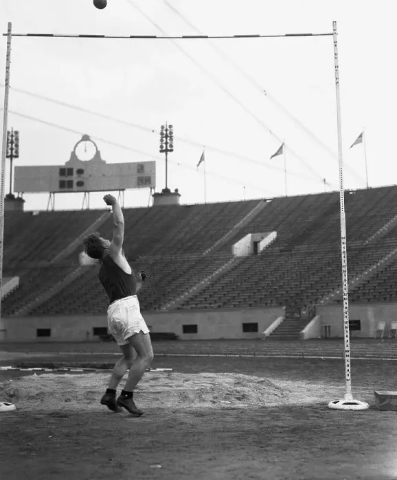 Framed Print : Athlete Tossing Weight Framed Print : Athlete Tossing Weight