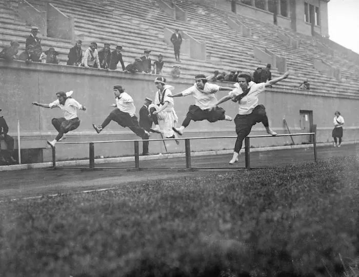 Framed Print : Athletes Jumping over Hurdles Framed Print : Athletes Jumping over Hurdles