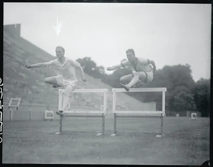Framed Print : Athletes Practicing Their Hurdling Framed Print : Athletes Practicing Their Hurdling