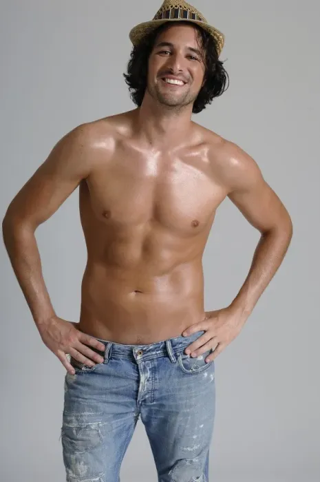 Framed Print : Athletic man, early 30s, bare-chested wearing jeans and a hat Framed Print : Athletic man, early 30s, bare-chested wearing jeans and a hat