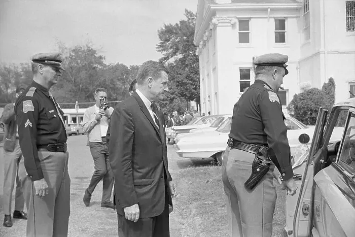 Framed Print : Attorney General Leaving Courthouse