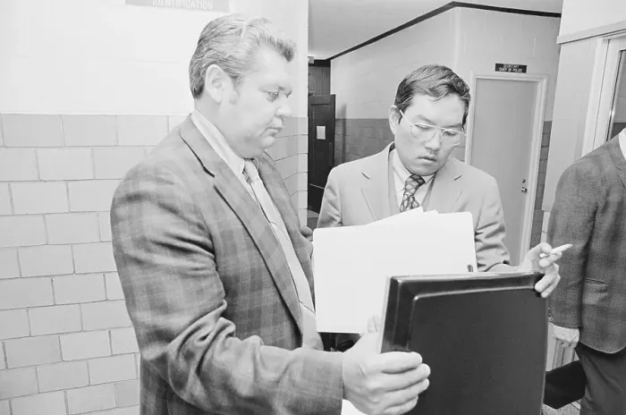 Framed Print : Attorney Peter A. Chang Jr. and Inspector Richard F. Verbrugge Checking Files Framed Print : Attorney Peter A. Chang Jr. and Inspector Richard F. Verbrugge Checking Files
