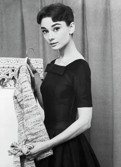 Framed Print : Audrey Hepburn Holding Coat by Givenchy Framed Print : Audrey Hepburn Holding Coat by Givenchy