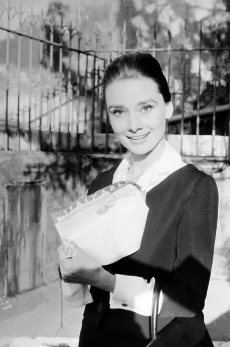 Framed Print : Audrey Hepburn Holding Telegram