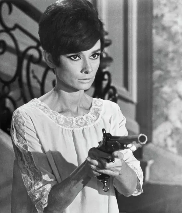 Framed Print : Audrey Hepburn Pointing a Gun