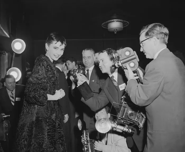 Framed Print : Audrey Hepburn with Reporters after Winning Oscar Framed Print : Audrey Hepburn with Reporters after Winning Oscar