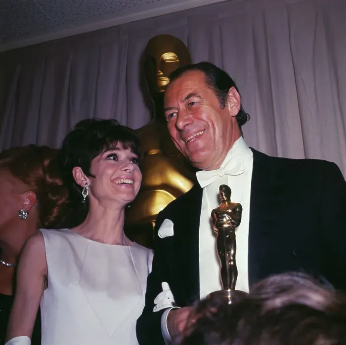 Framed Print : Audrey Hepburn with Rex Harrison Holding Academy Award Framed Print : Audrey Hepburn with Rex Harrison Holding Academy Award
