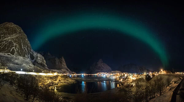 The aurora belt over Lofoten fishing village, Norway