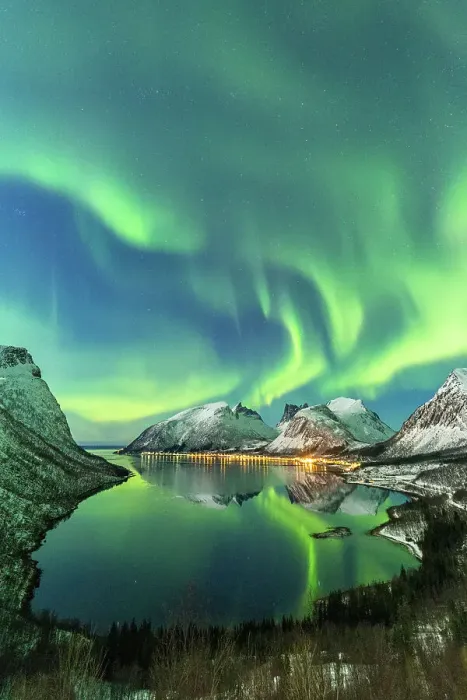 Framed Print : The aurora borealis lights up in the sky and is reflected in the fjord. Northern Norway, Europe Framed Print : The aurora borealis lights up in the sky and is reflected in the fjord. Northern Norway, Europe