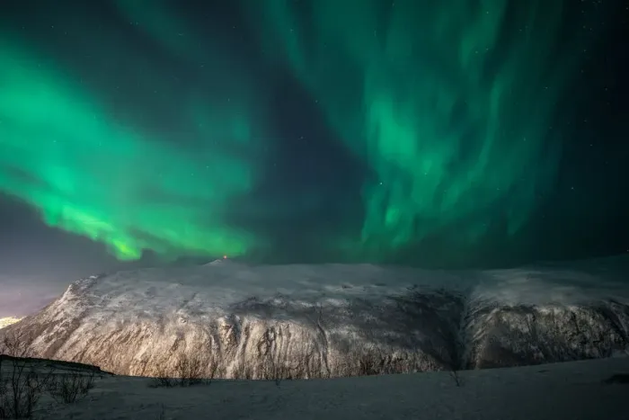 Framed Print : Aurora Borealis on a starry night behind a mountain, Tromso, Norway Framed Print : Aurora Borealis on a starry night behind a mountain, Tromso, Norway