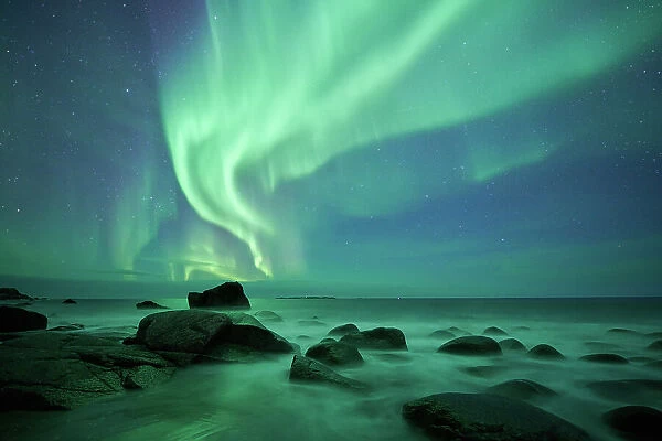 Aurora borealis over Uttakleiv beach
