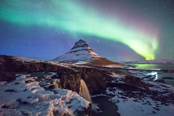 Aurora above mountain Kirkjufell mountain