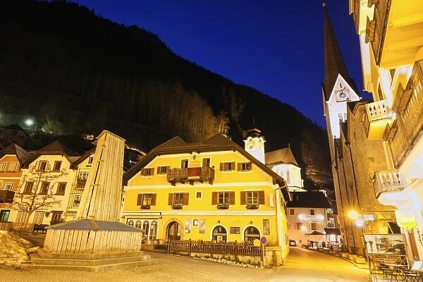Austria, Hallstatt, Illuminated town at night