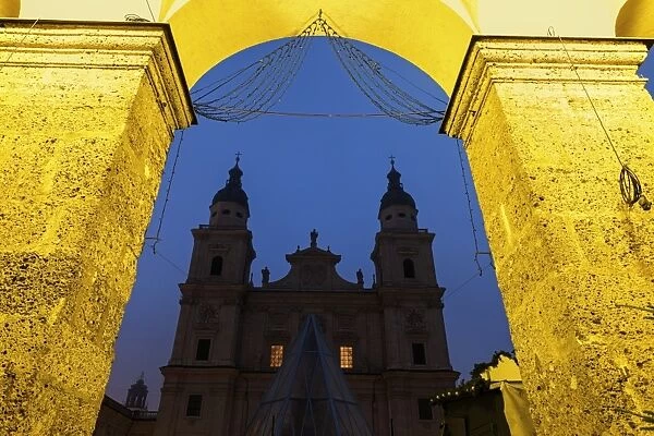 Austria, Salzburg, Salzburg Cathedral and arch against night sky